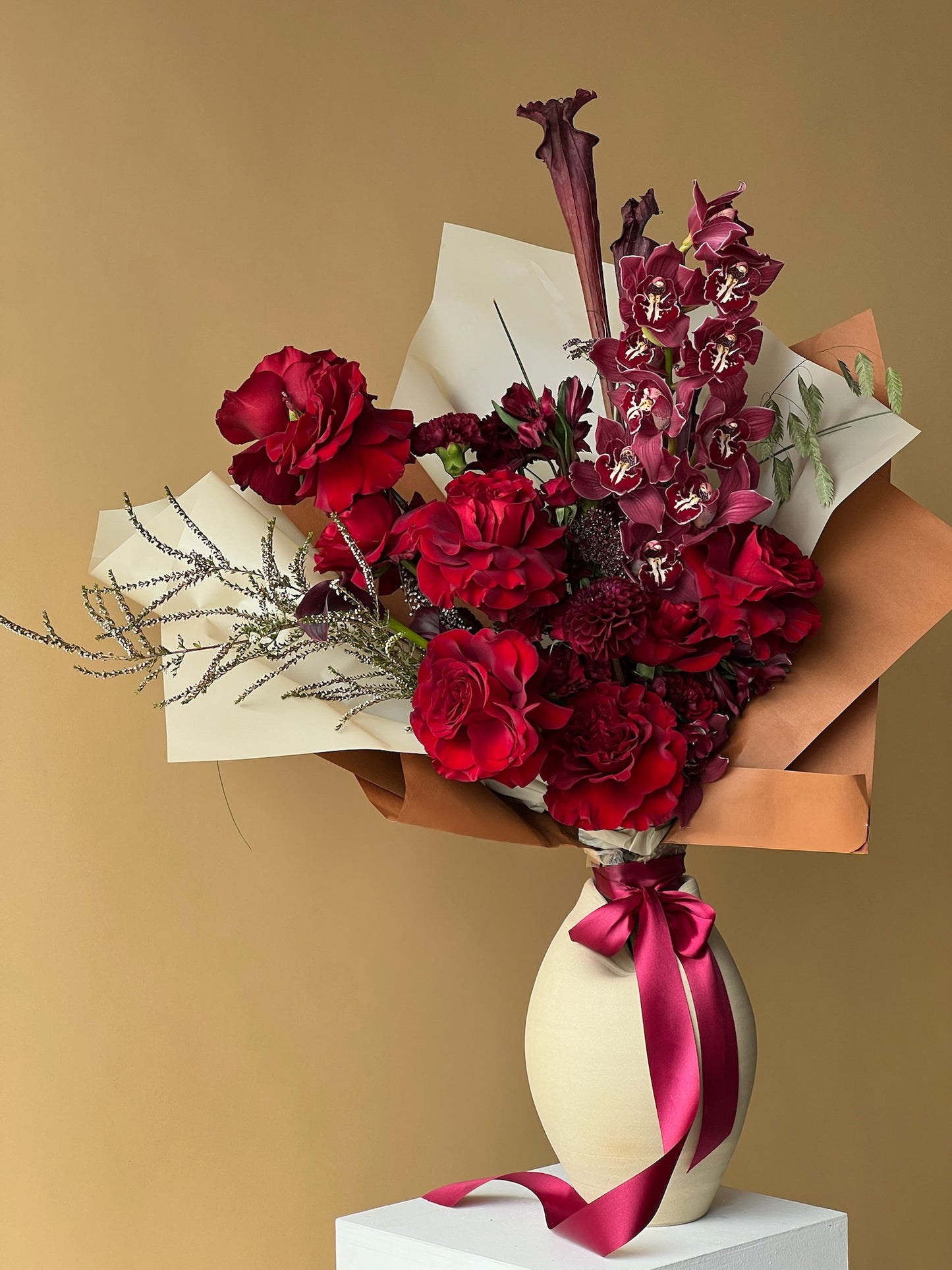 Vancouver Florist - Bouquet of flowers in a vase, passionate reds