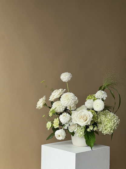 Vancouver Florist - Floral arrangement in a white vase 