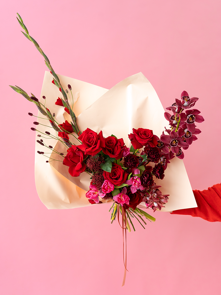 Vancouver Flower Delivery - Valentine's Bouquet of red and pink flowers on a pink background